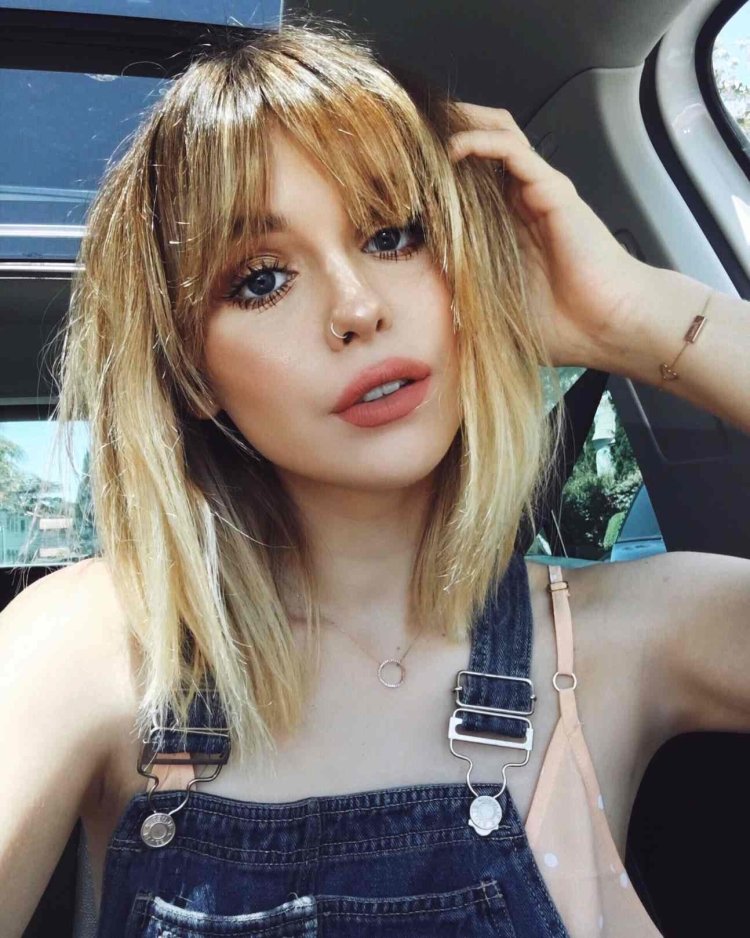 Виктория Маслова с короткой стрижкой