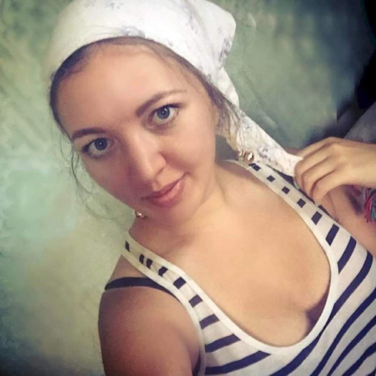 Девушка в пуховом платке