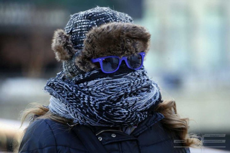 Укутанная девушка