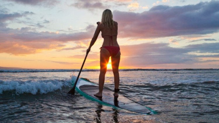 Woman on sup Board