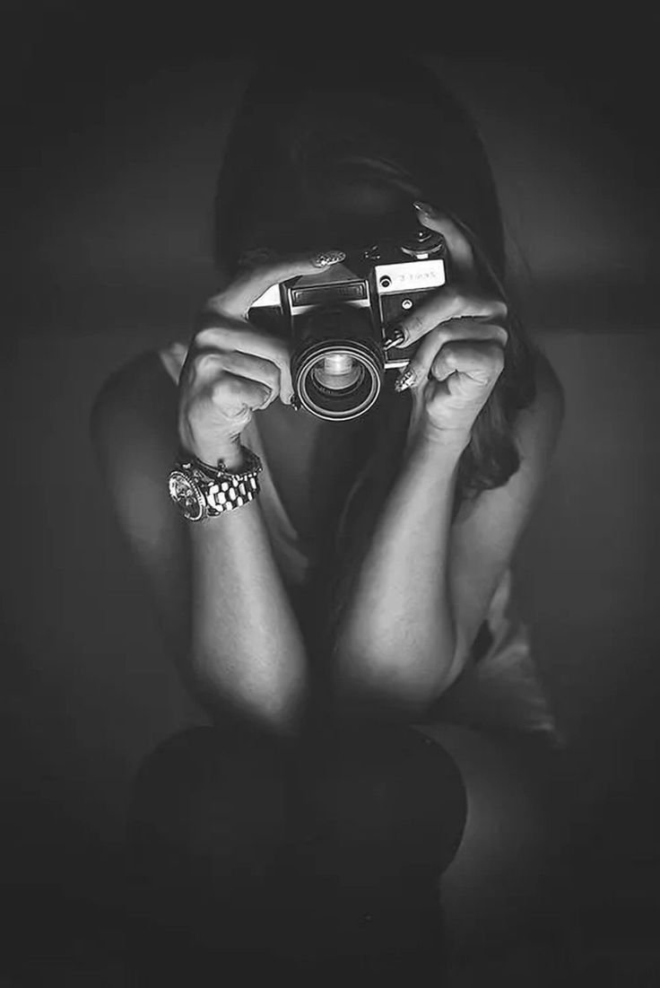 Девушка с фотоаппаратом