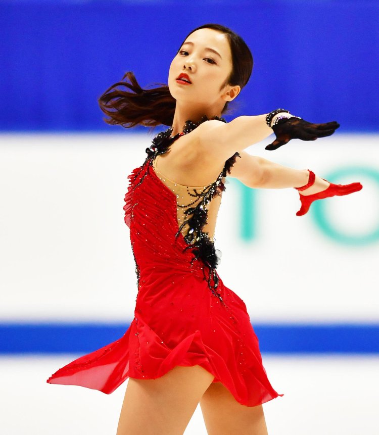 Японской фигуристкой Марин хондой.