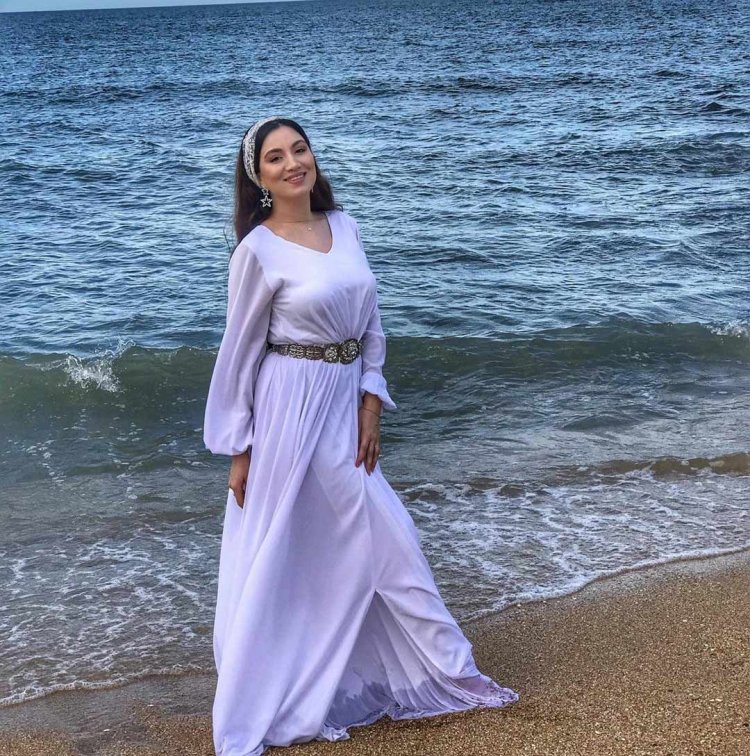 Анора Зулаева