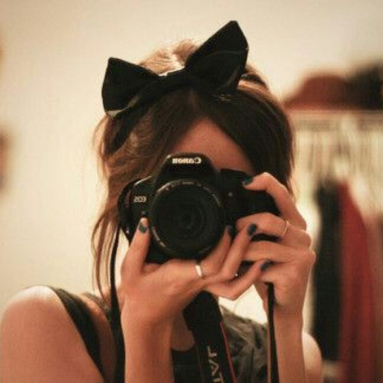Девушка с фотоаппаратом