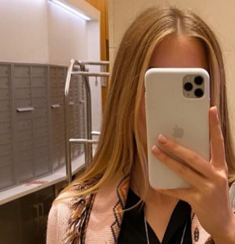 Девушка с айфоном 13