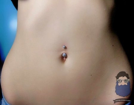 Пупок пирсинг