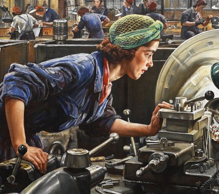 Женщина токарь на заводе