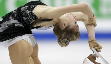 Фигуристка Елена Радионова в купальнике