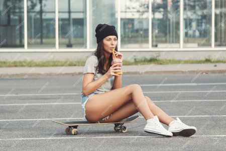 Skater girl sitting
