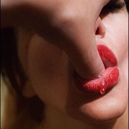 Женские губы с языком