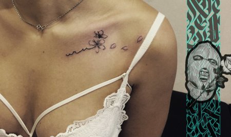 Тату на груди женщины