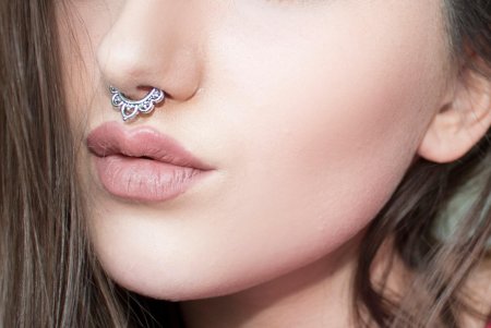 Прокол носа септум