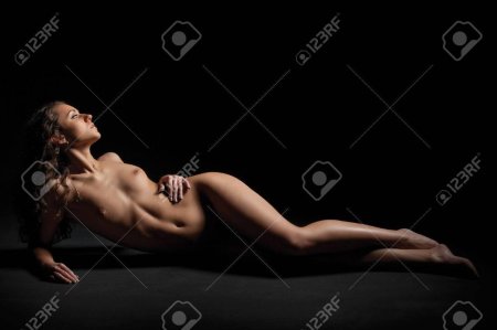 Naked woman lying down