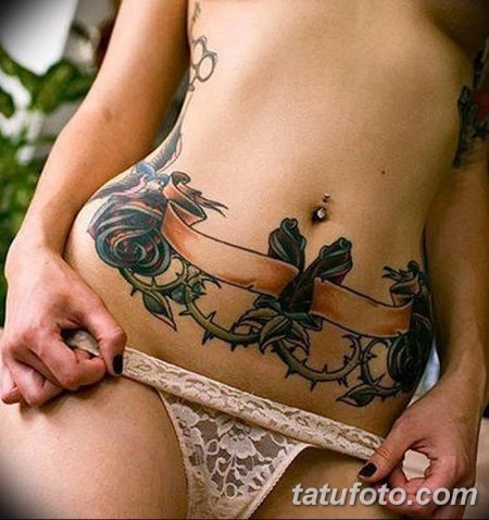 Женские тату на животе