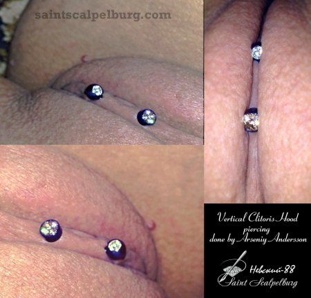 Вертикальный пирсинг капюшона клитора