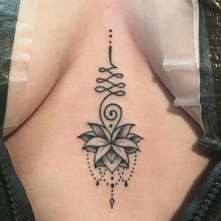 Тату уналоме с лотосом