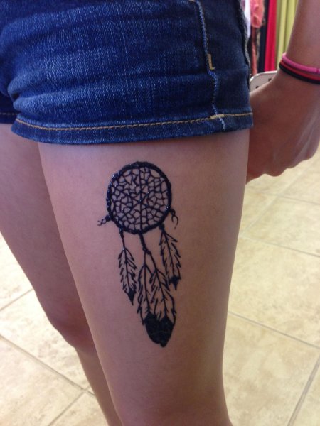 Ловец снов тату на ноге
