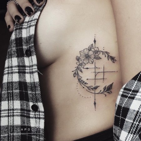 Тату на ребрах женские