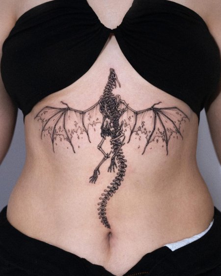 Женская тату на спине
