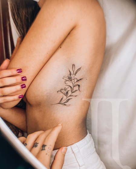 Пума тату для девушек на рёбрах