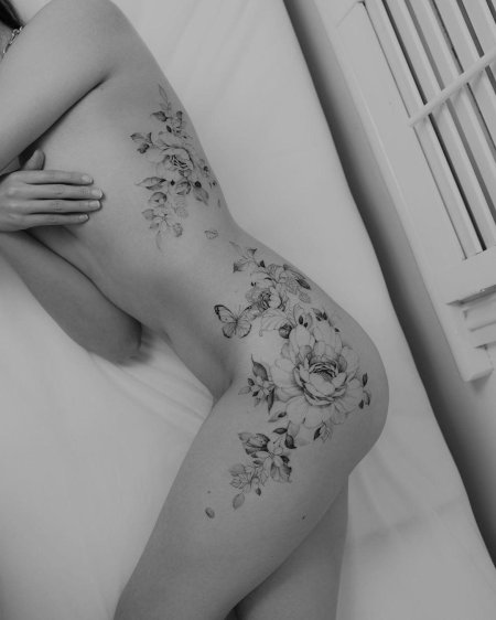 Татуировка на бедре женская