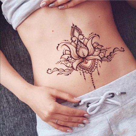 Татуировки для девушек на животе