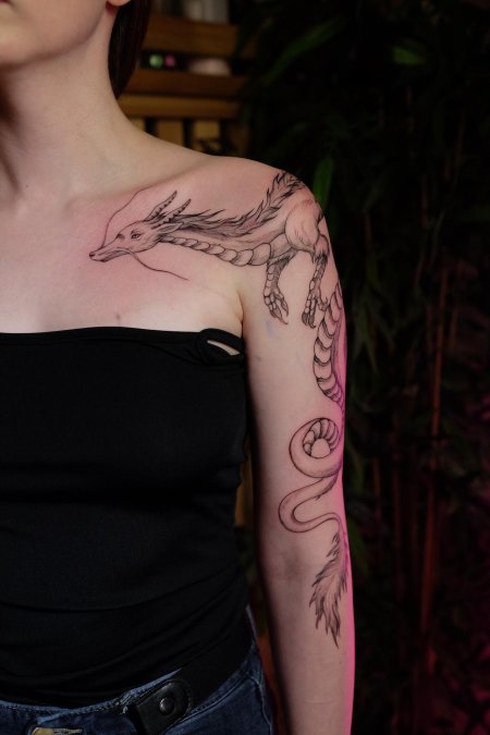 Тату дракона для девушек