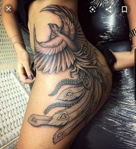 Тату феникс на бедре