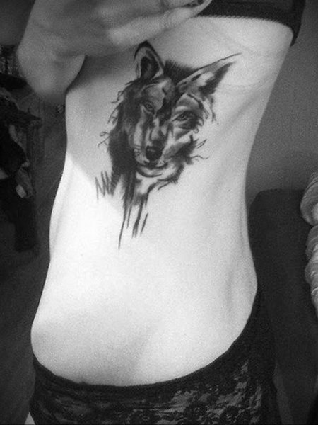Тату волчица для девушки