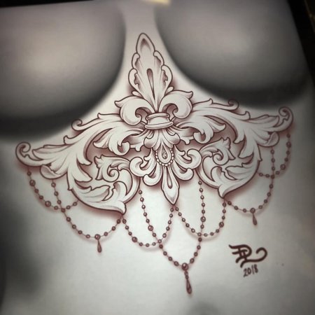Тату под грудью женские