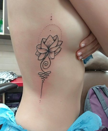Тату уналоме с лотосом