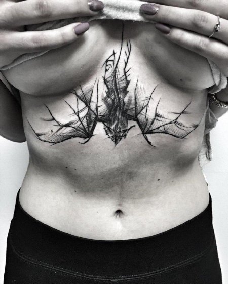 Тату под грудью необычные