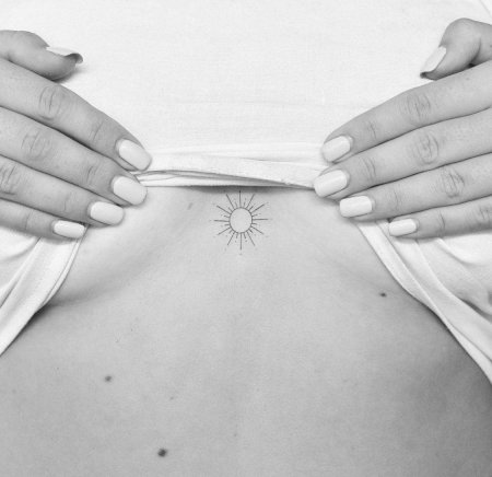 Солнце татуировка