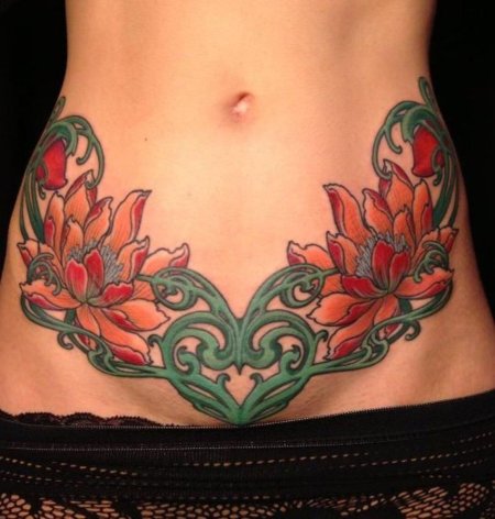 Женские тату на животе