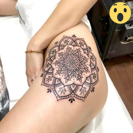 Тату мандала на бедре