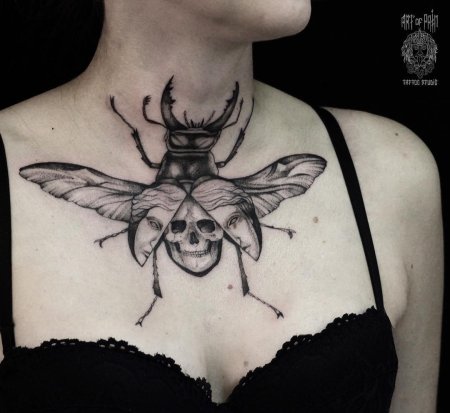 Тату жук скарабей