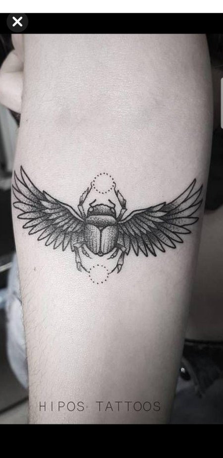 Тату жук скарабей