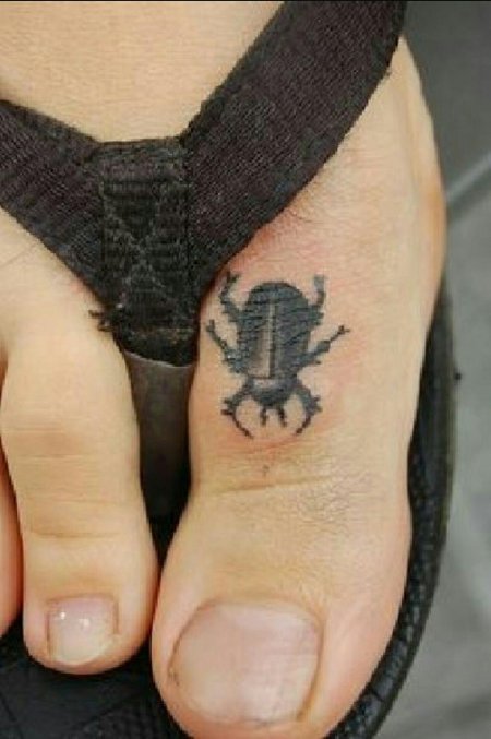 Маленькая тату жука