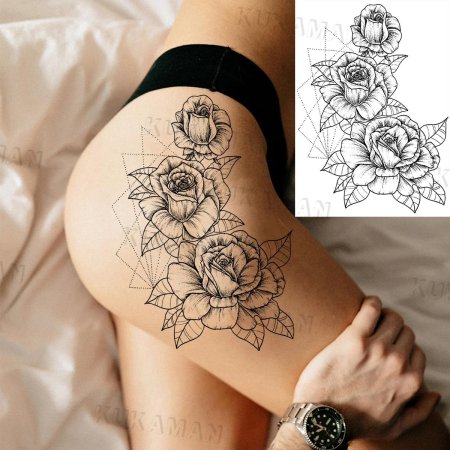 Женская татуировка на бедре