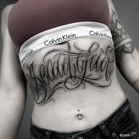 Тату на животе женские