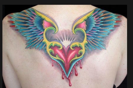Тату с крыльями