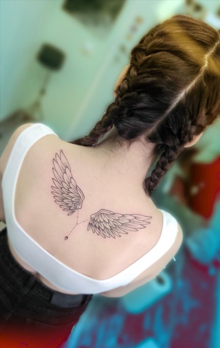 Крылья тату на спине
