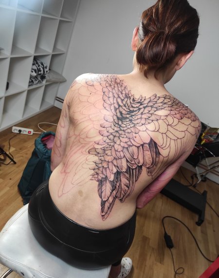 Крылья на спине тату мужские