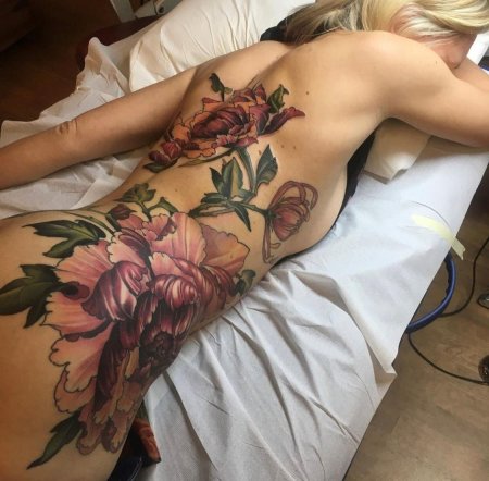 Татуировка цветок