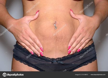 Пирсинг пупка в