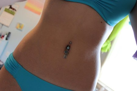 Красивый пупок у девушек