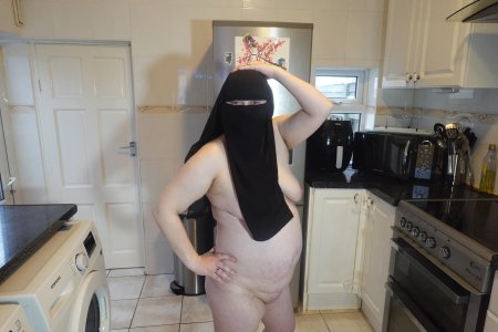 Pregnant wife in muslim niqab and nursing bra