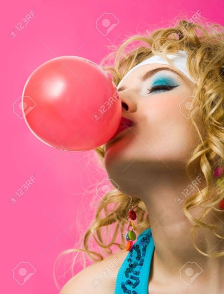 Blowing bubble gum