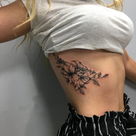 Тату для девушек на ребрах