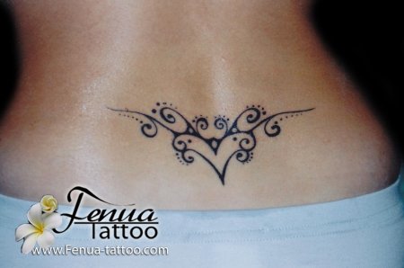 Женские тату на пояснице